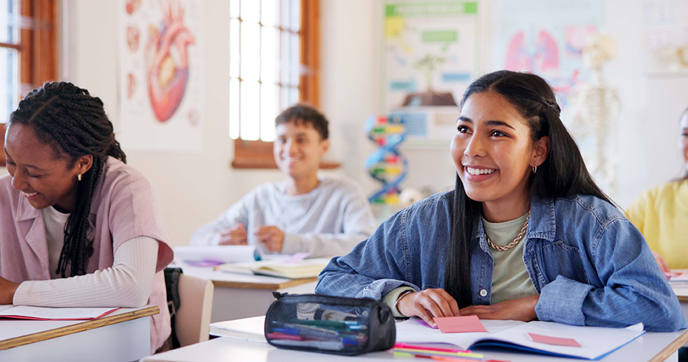 Female Student Smiling in Classroom
