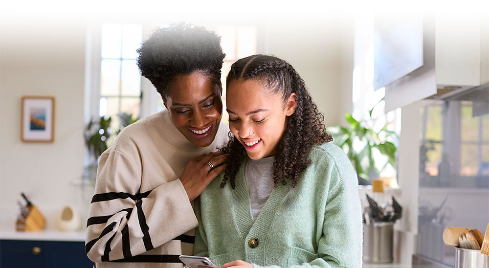 Mother and Daughter Looking at a phone