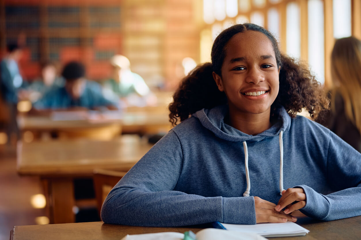 Female Student in Class Looking at Camera